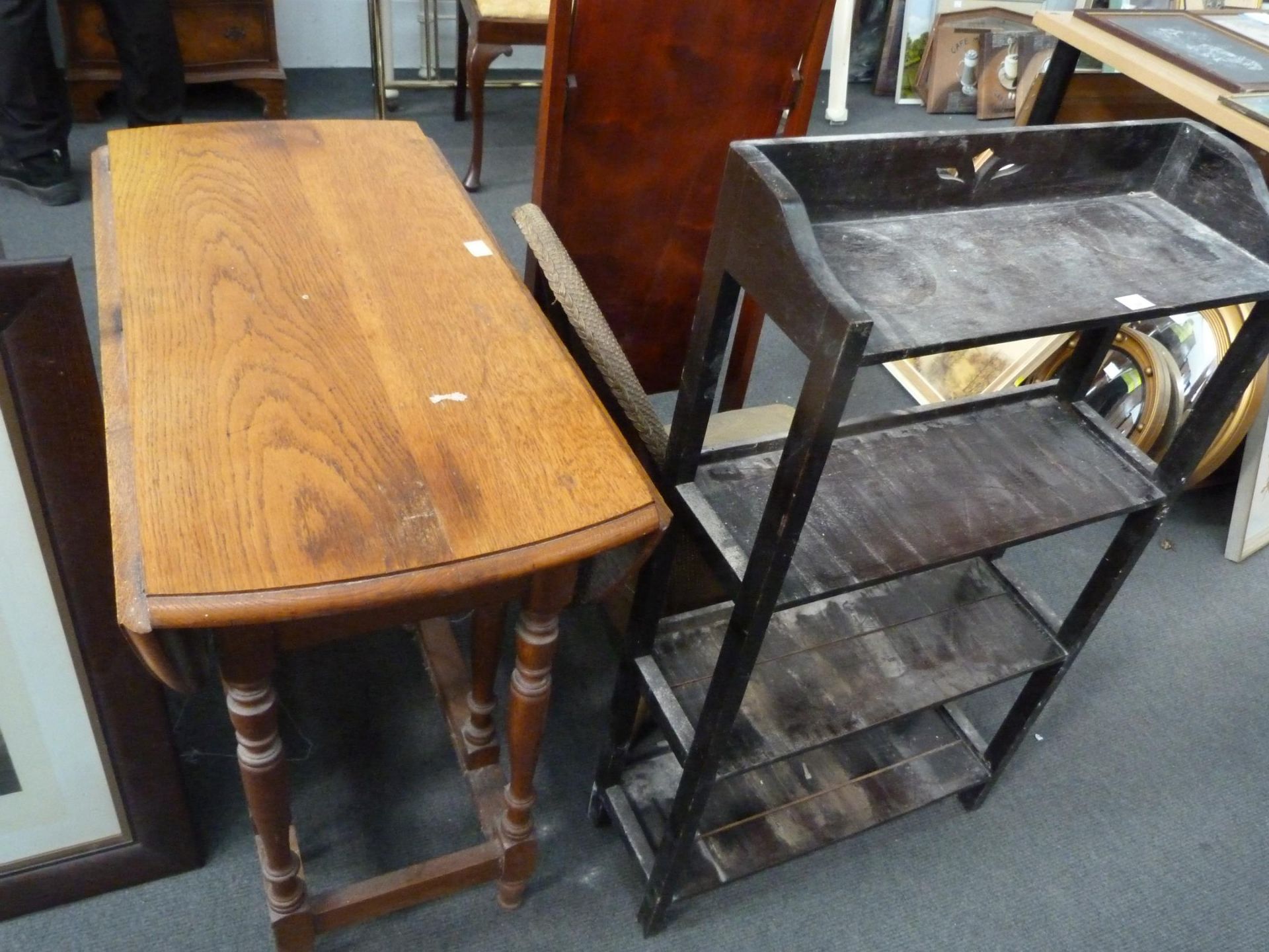 An Oak Oval Gateleg Dining Table, a Cheval Mirror, Open Bookcase and a Basket Chair (4) (Est. £ - Image 4 of 4