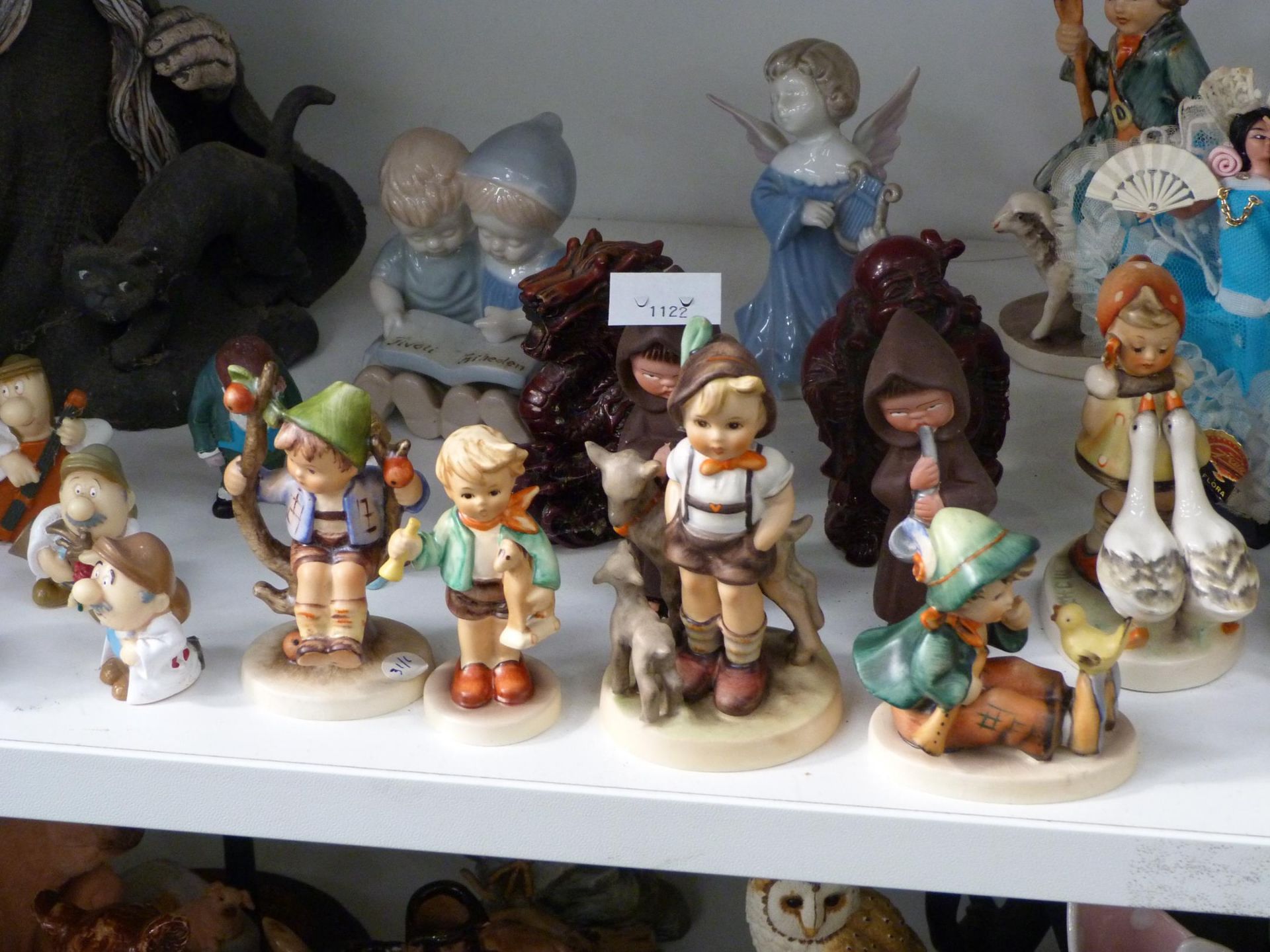 Three shelves to include a selection of Human and Animal Figurines such as five Goebel Children - Image 2 of 13