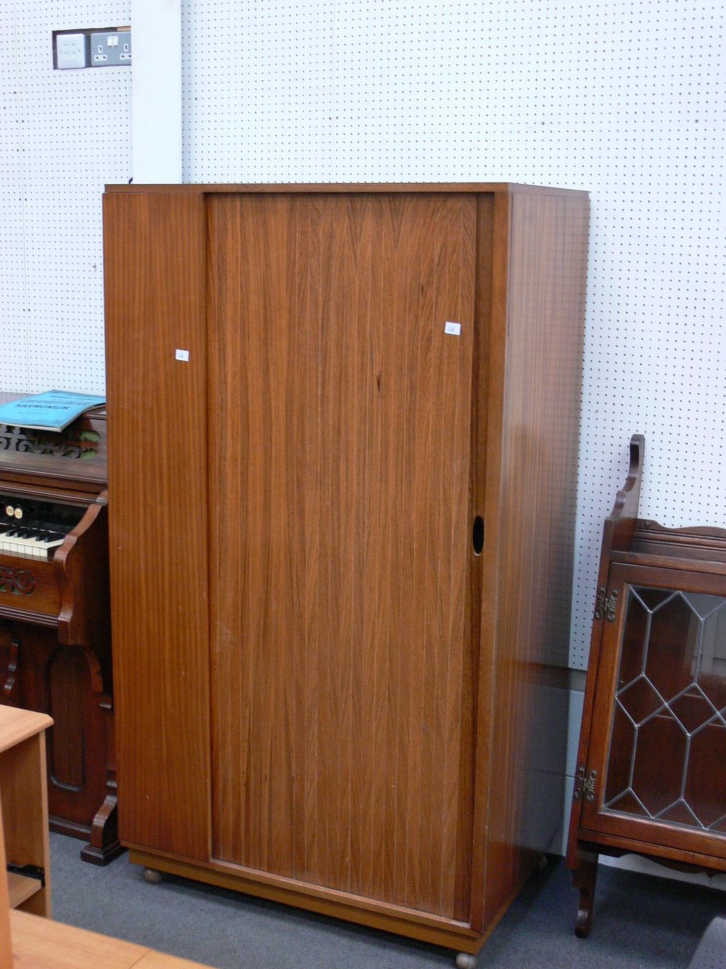 An Austinsuite of London Bedroom Unit with Tambour Fronted Door with full size clothes rail with 4