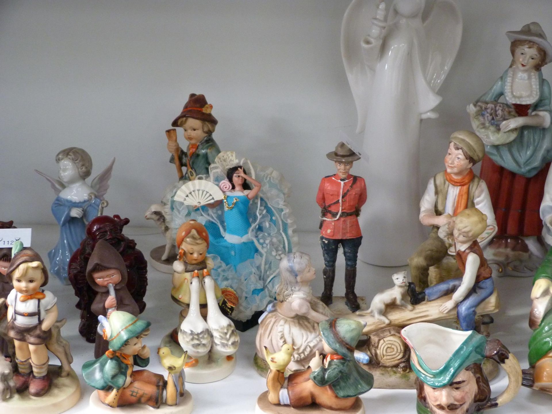 Three shelves to include a selection of Human and Animal Figurines such as five Goebel Children - Image 4 of 13