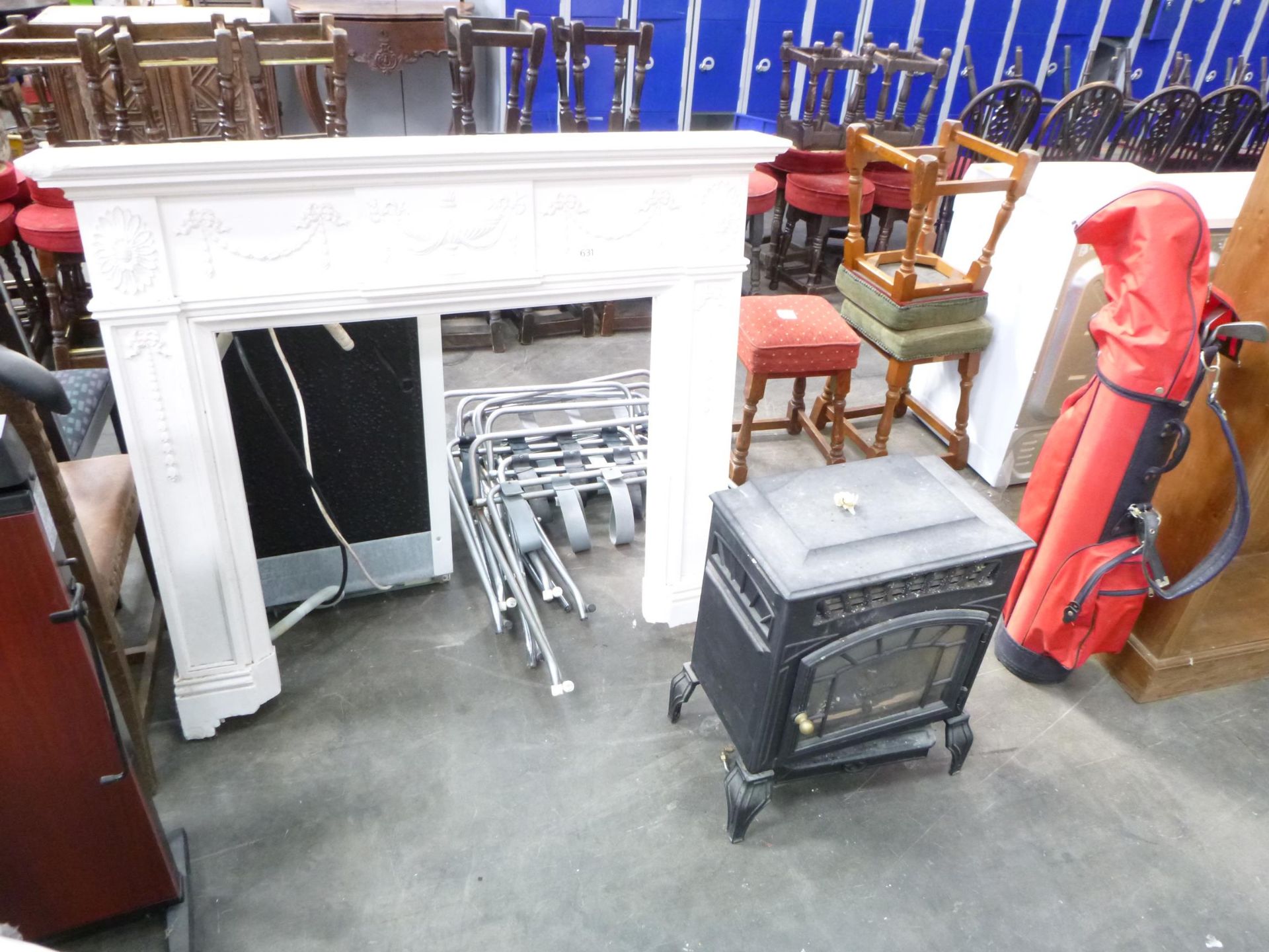 A Fire Surround A/F, A Gas Stove A/F and a Golf Bag and Clubs.