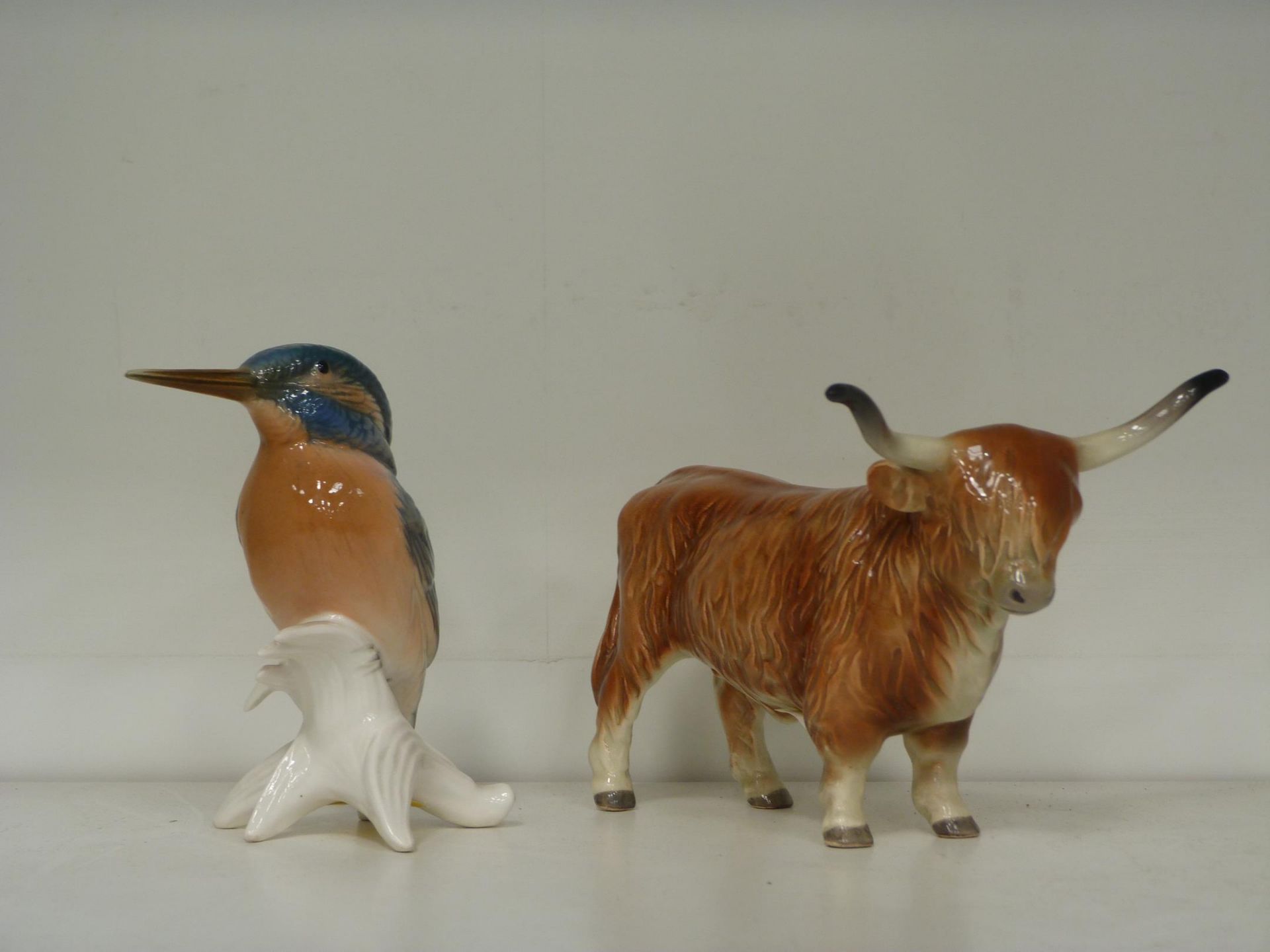 A Karl Ens Volkstedt Porcelain Kingfisher accompanied by a 1950's vintage Cortendorf Highland Cow (