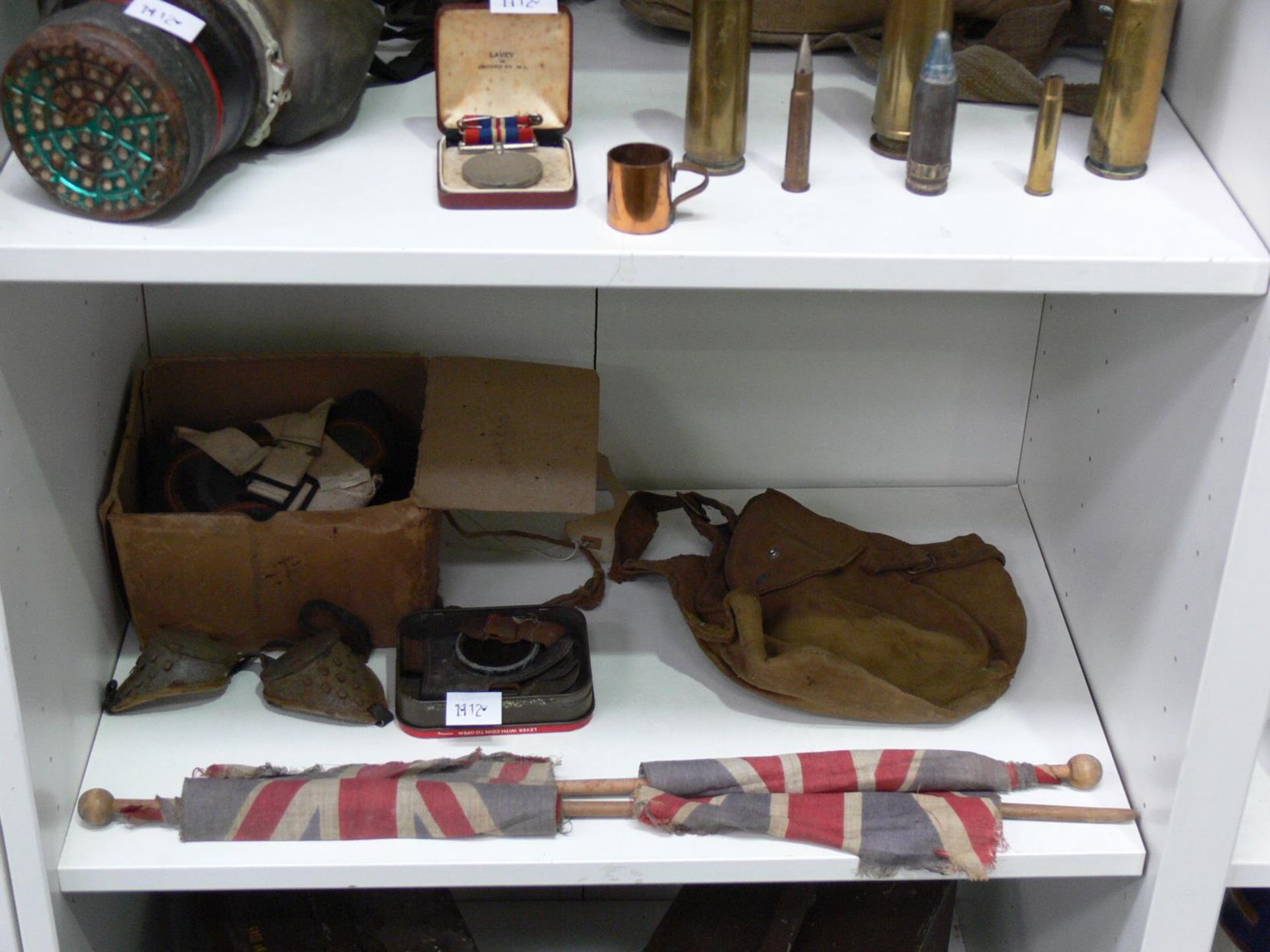 Four shelves to contain Military items to include an 'ARP' Helmet, Gas Mask, Goggles, Ammunition - Image 3 of 5