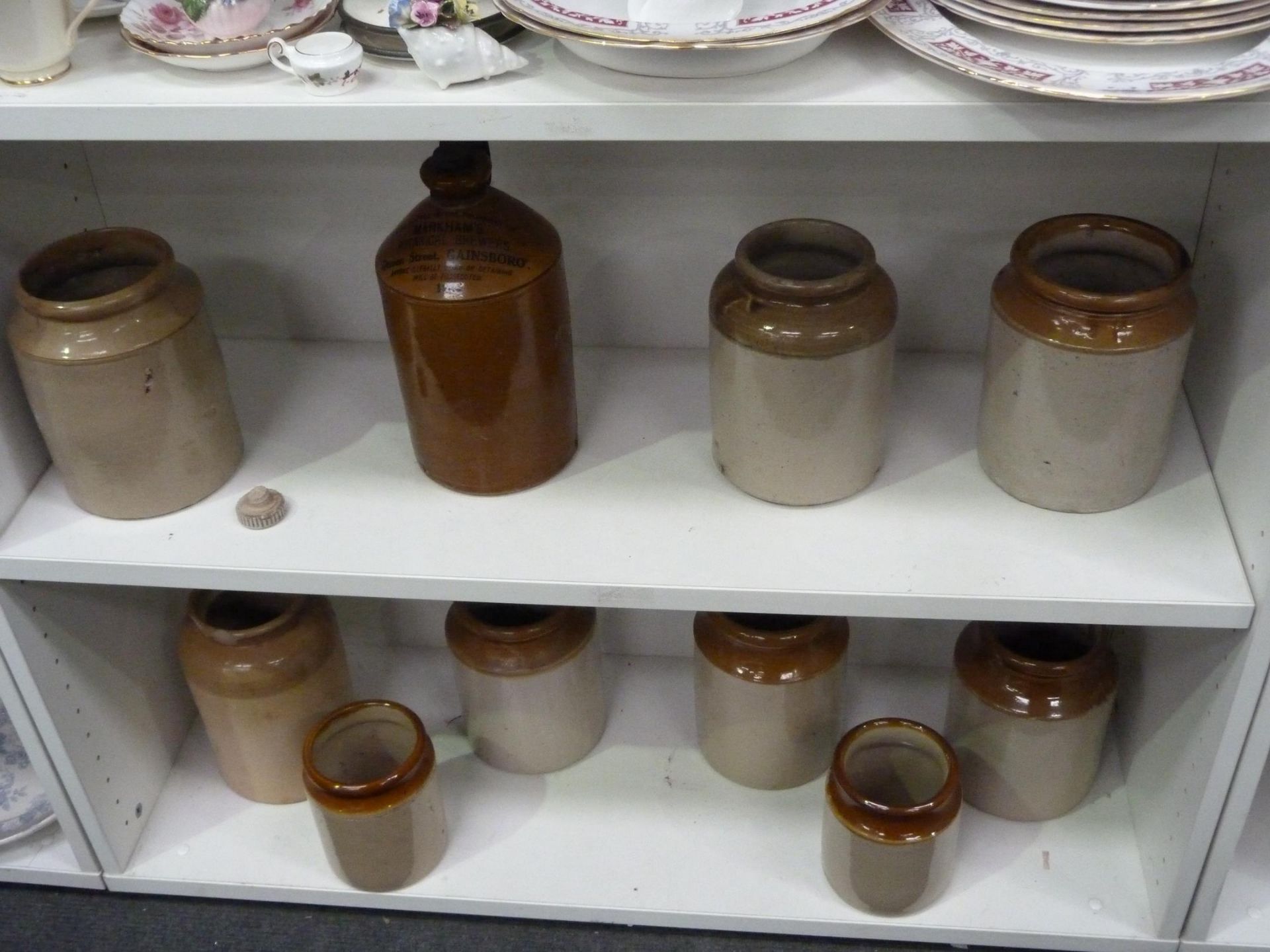 * A Stoneware Bottle from 'Markhams Botanical Brewers' Queen Street, Gainsboro' 1946 along with nine