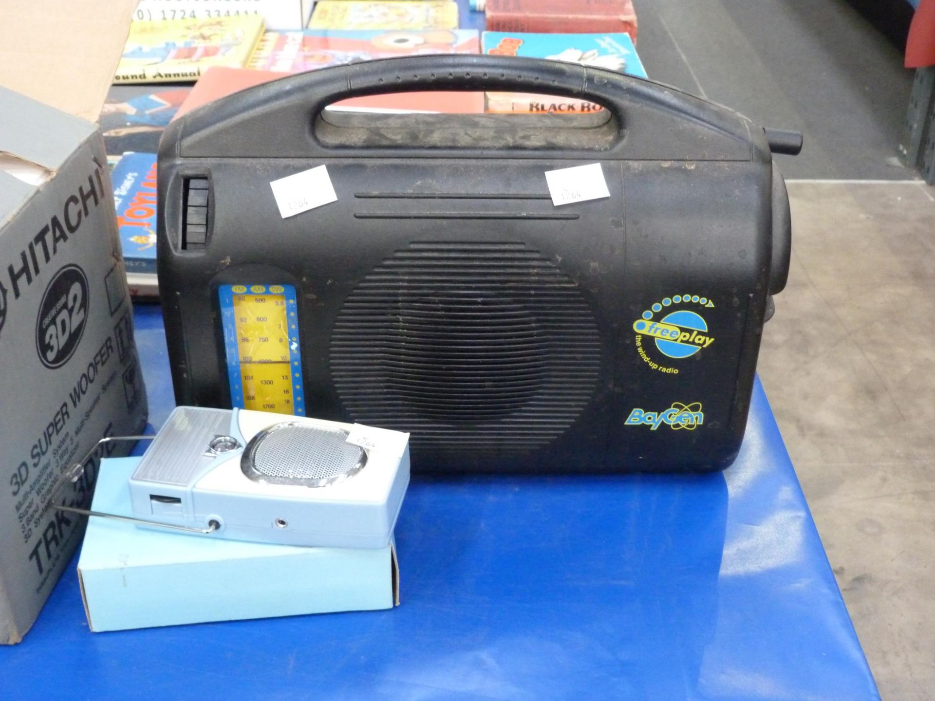 A boxed Hitachi High Performance Portable Creative Sound System (TRK-3D2E) together with a Baygen