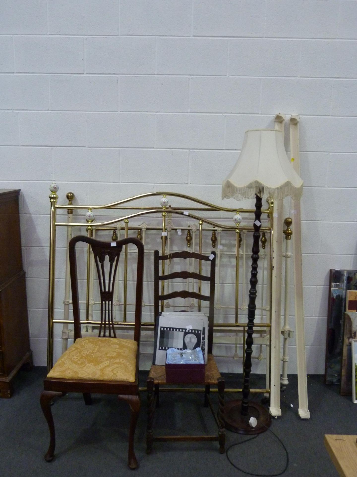 A Ladder Back Chair with Raffia Seat and Barley Twist Front Legs together with an Upholstered Dining