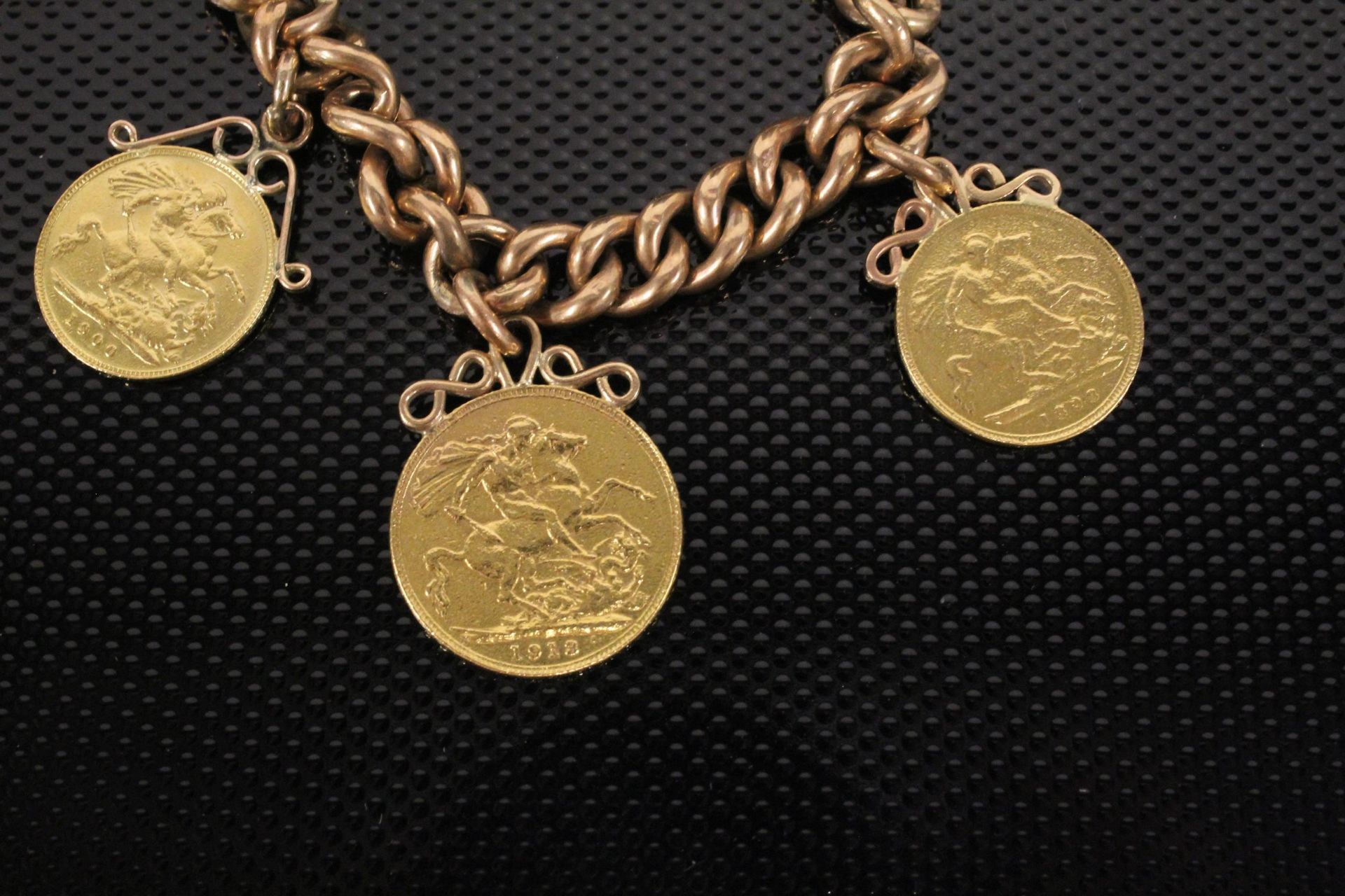 A 9ct Gold chain Bracelet set with a George V 1913 Full Sovereign and 2 Victorian half Sovereigns, - Image 2 of 3
