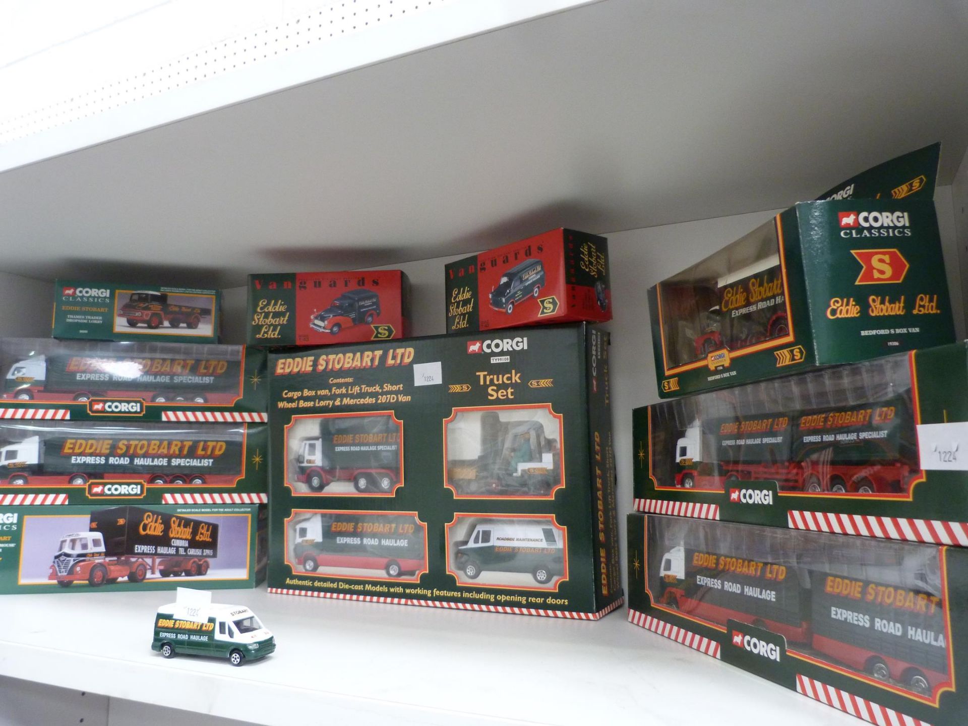 A shelf of Eddie Stobart Ltd, mainly boxed Diecast Vehicles to include a Truck Set, Volvo Skeletal