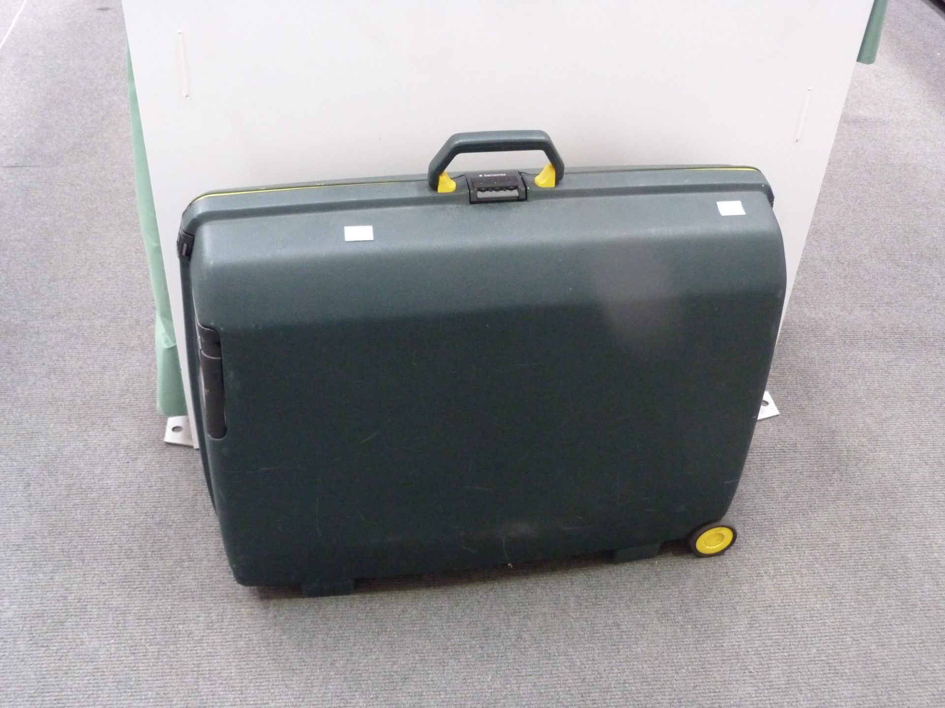 A Green Samsonite Suitcase (est. £20-£30)
