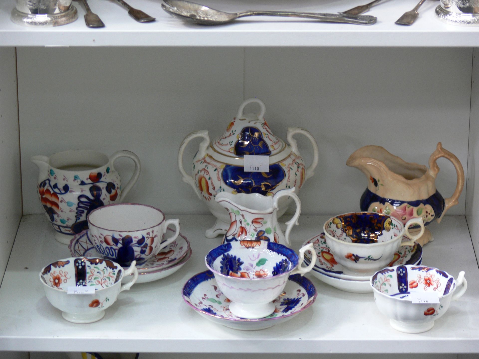 Two shelves to contain Gaudy Welsh Ceramic Tea Cups and Saucers of various designs, as well as