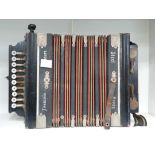 This is a Timed Online Auction on Bidspotter.co.uk, Click here to bid. A Ten Key Melodeon with steel