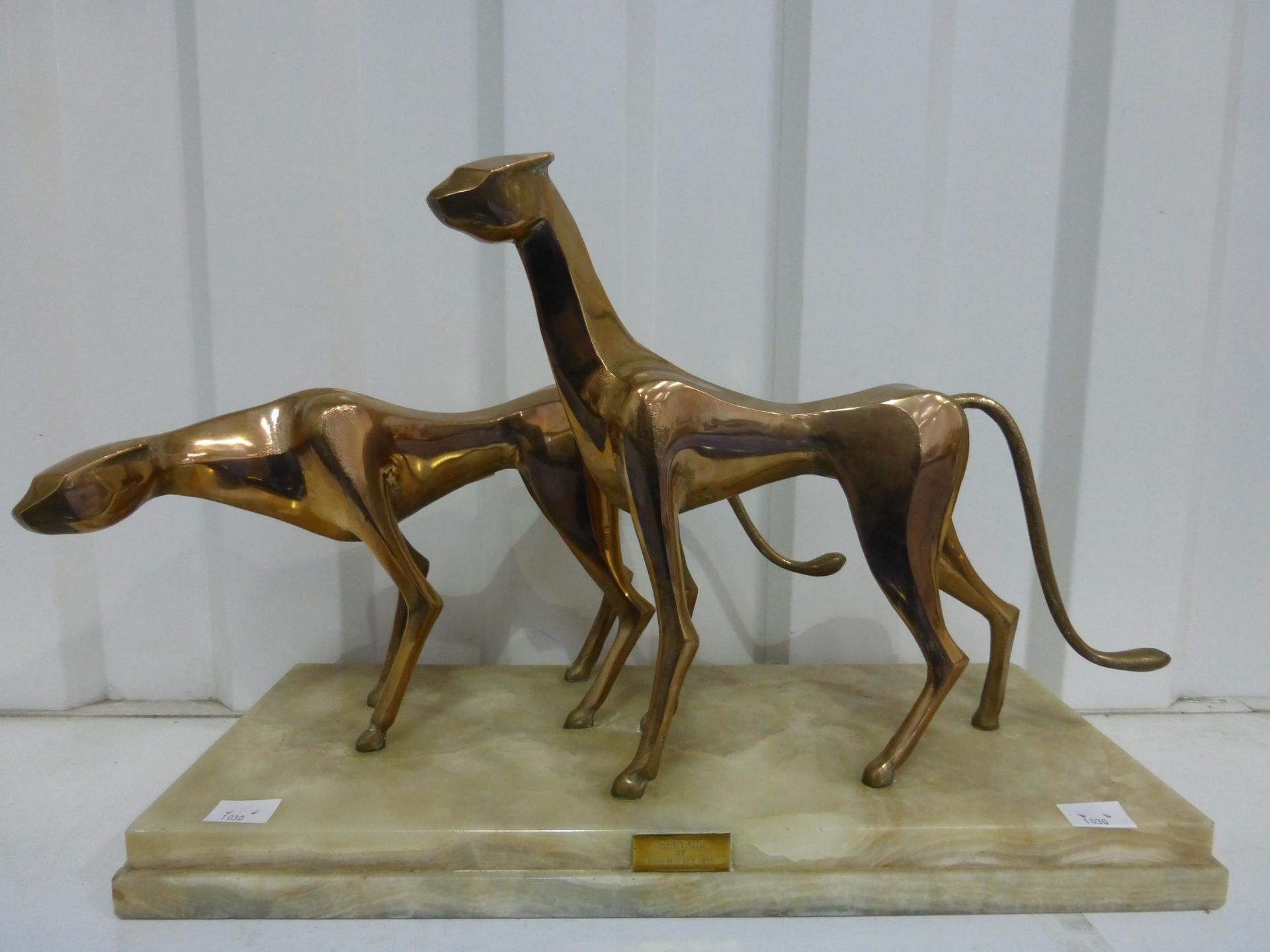A John Mulvey Sculpture titled 'Cheetah's 1975 depicting two brass