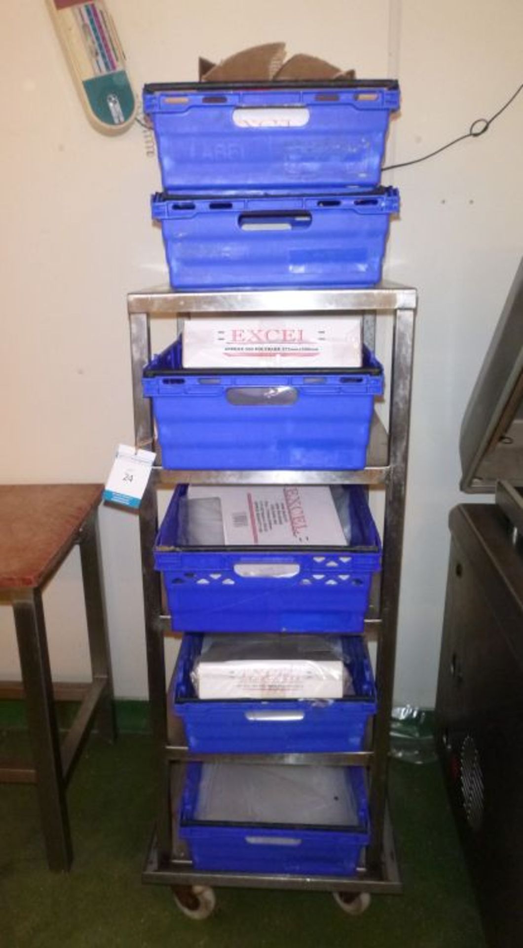 * Stainless Steel 5 Tier Trolley with crates of packaging