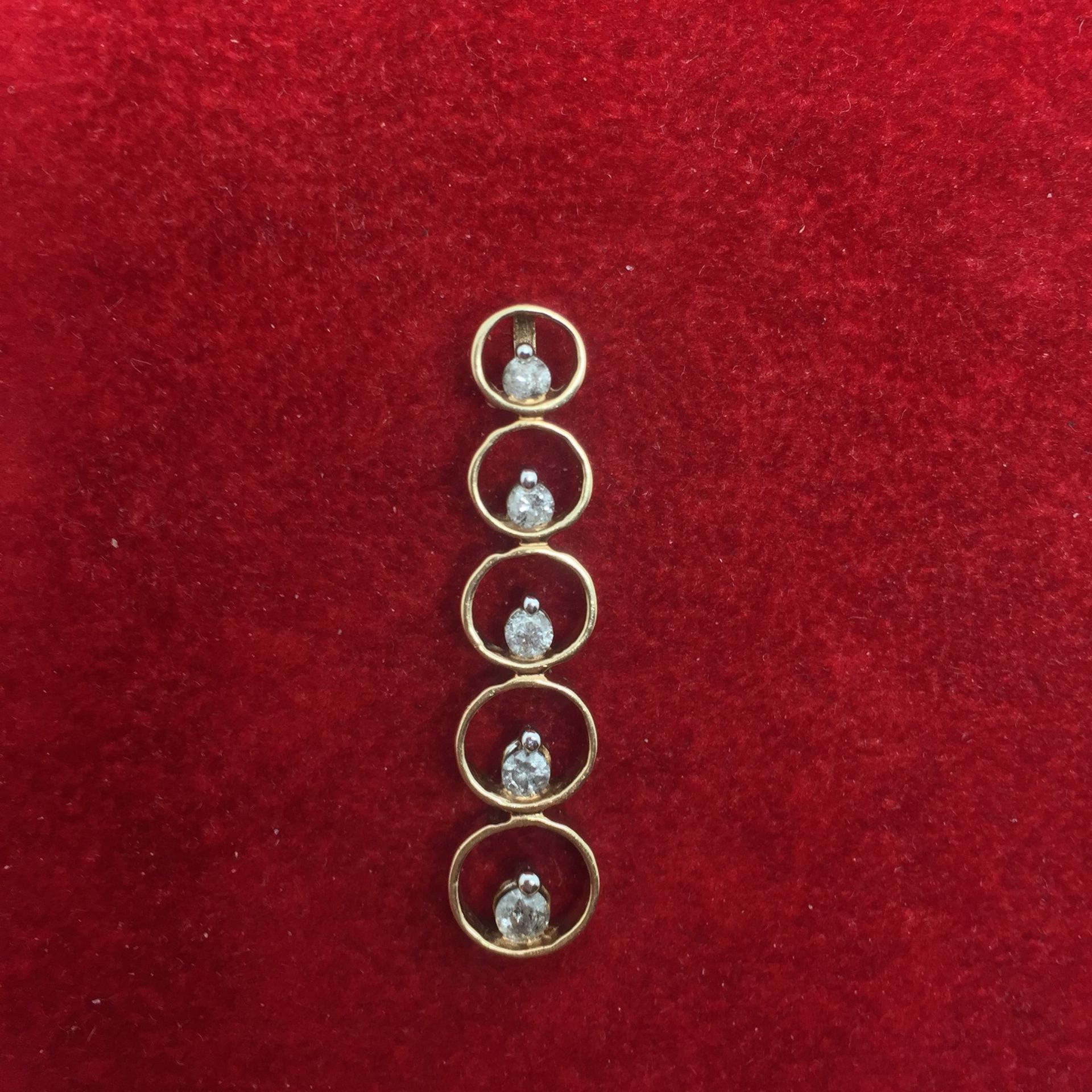 5x Diamond Drop Pendant in Yellow Metal marked 10k