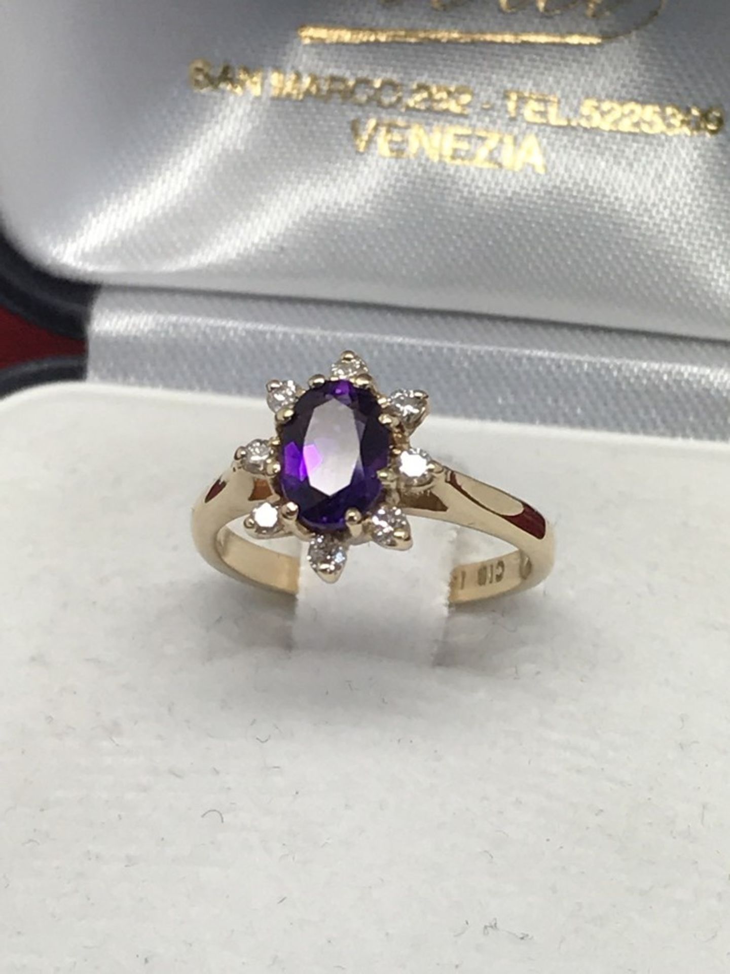 AMETHYST & DIAMOND RING SET IN YELLOW METAL TESTED AS 14ct GOLD