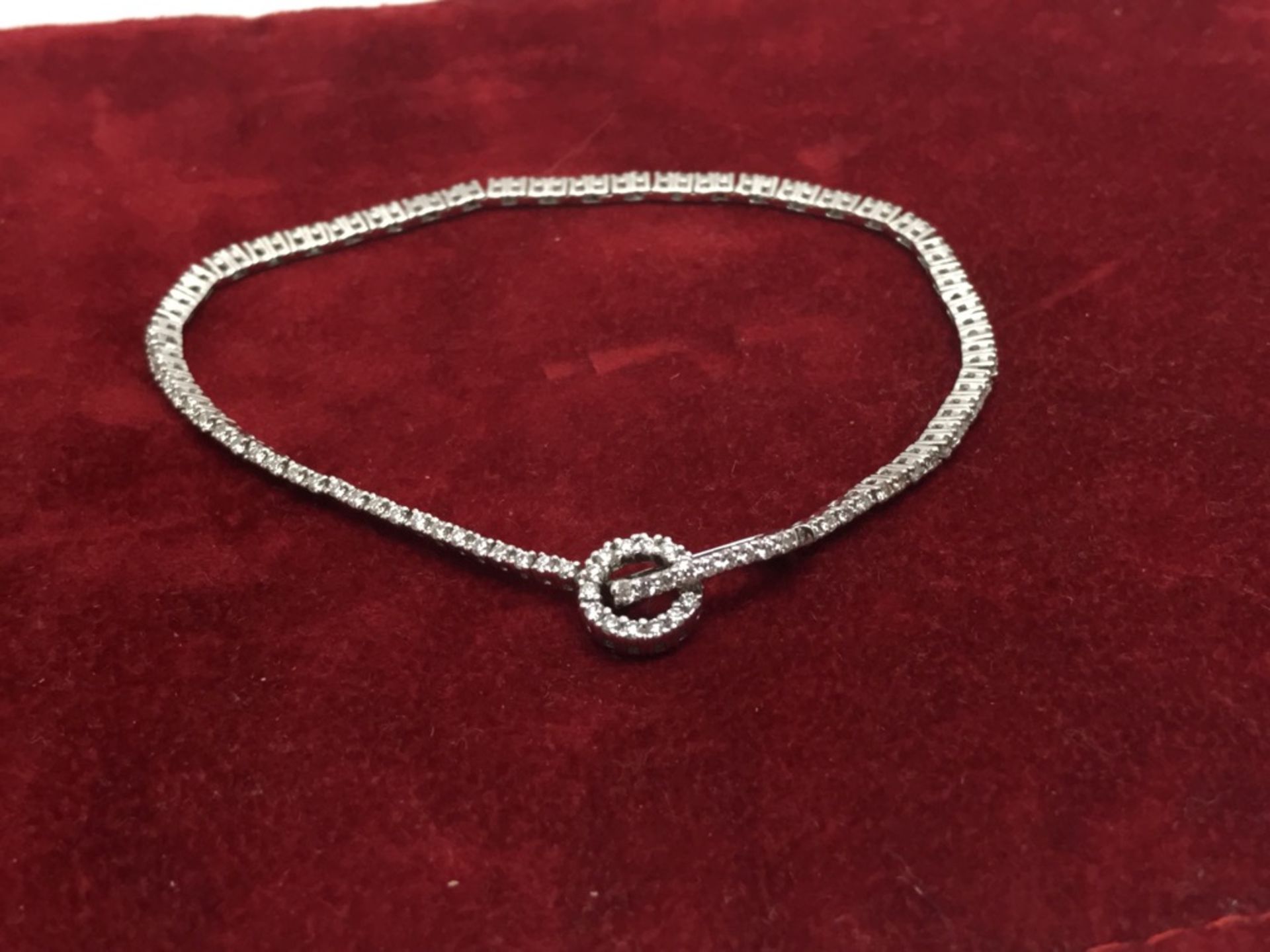 DIAMOND SET BRACELET IN WHITE METAL MARKED AU750 AND TESTED AS 18ct WHITE GOLD