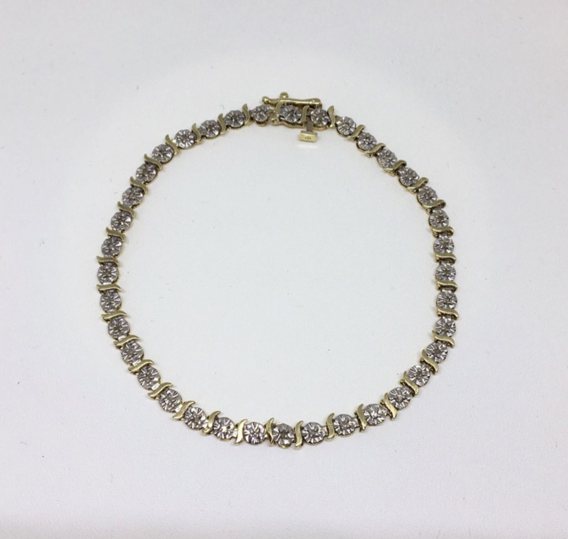 9ct GOLD DIAMOND BRACELET