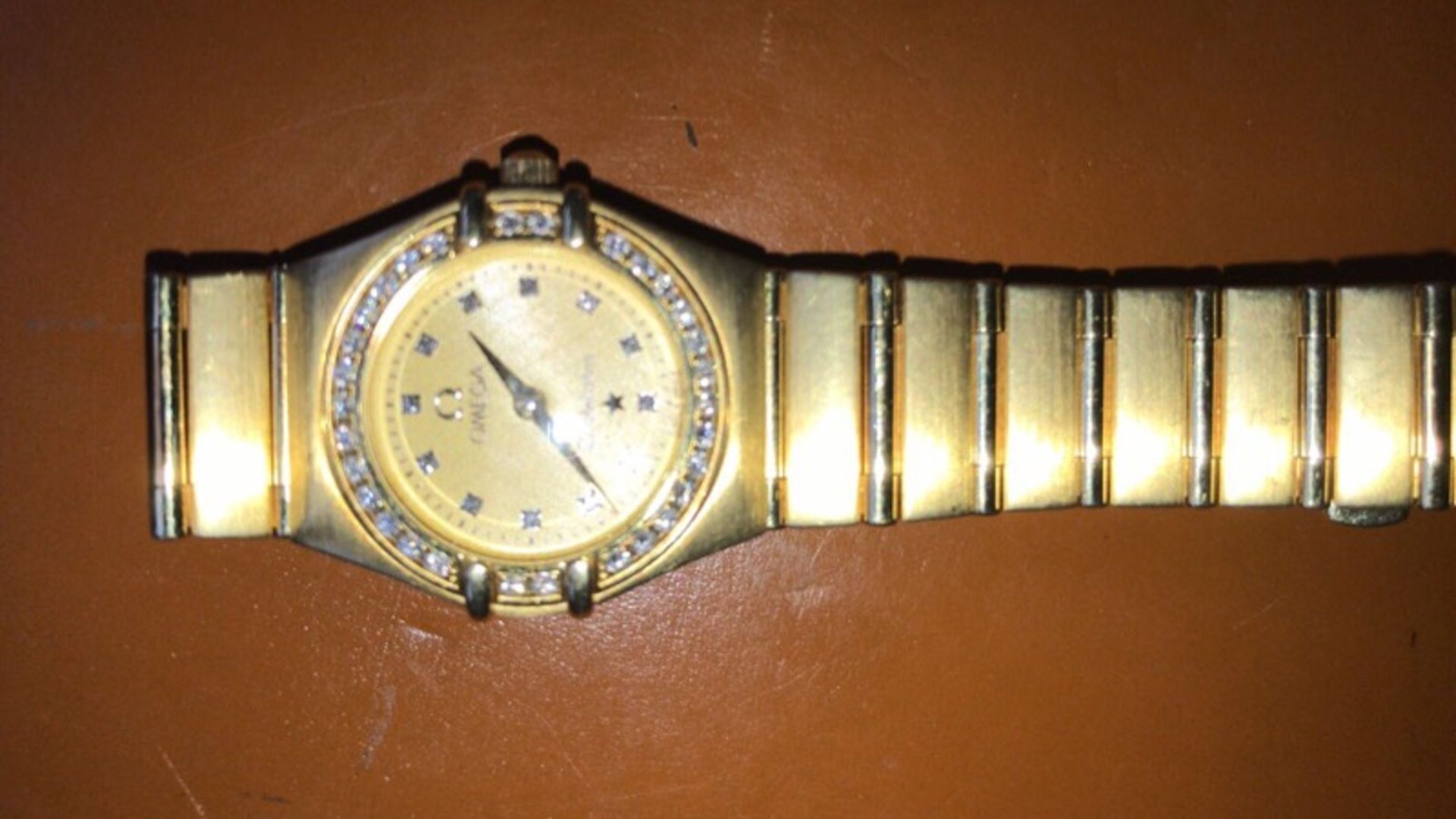 18k GOLD OMEGA WITH DIAMONDS