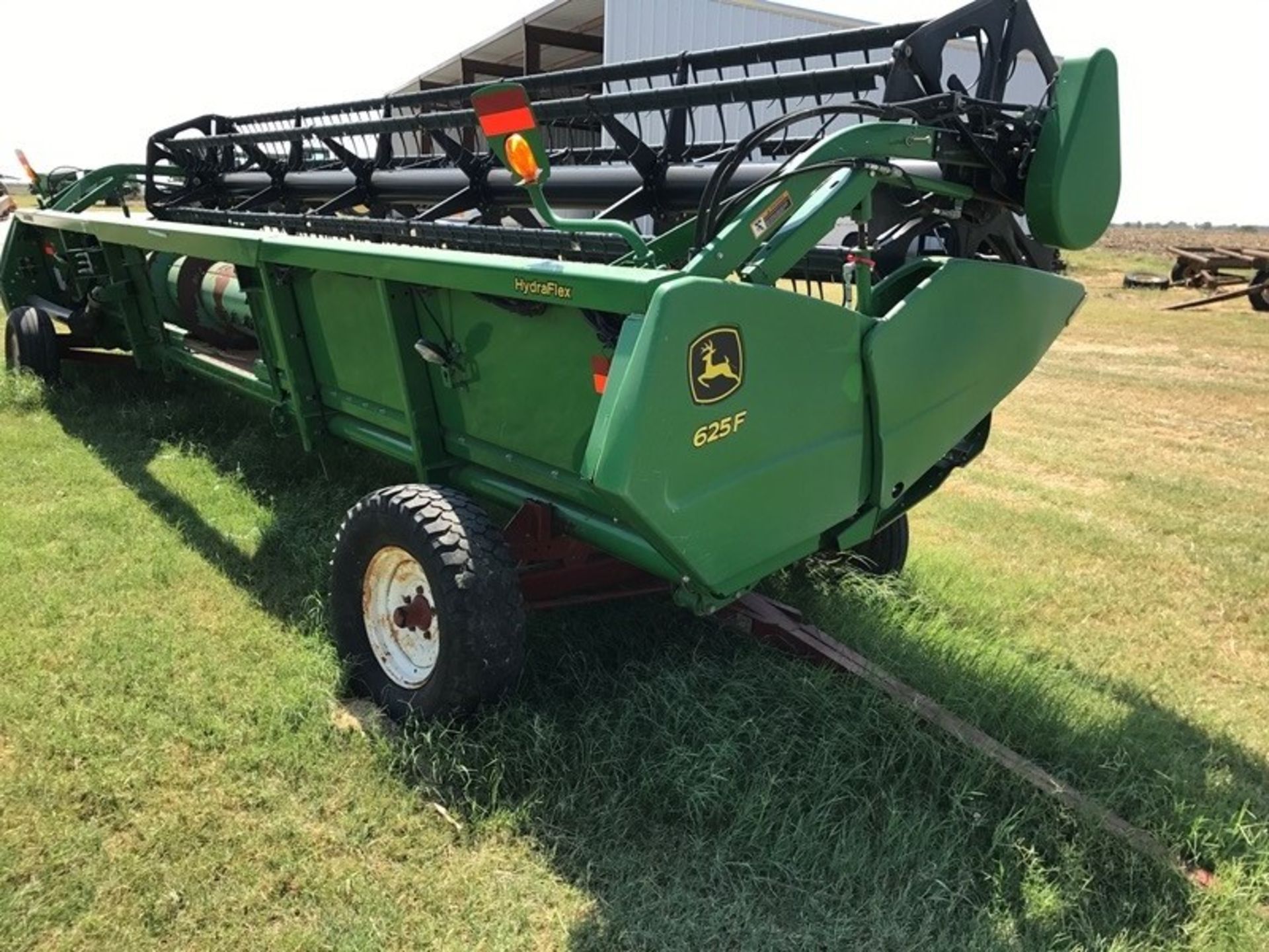 John Deere 625F Hydraflex Platform Head w/Trailer