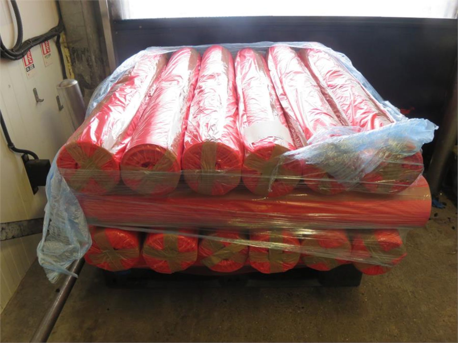 1 x Pallet of 1.25m rolls of red polythene wrapping bags. Lift out £50. CF2-995