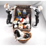 A Royal Doulton figure, puppy in a basket, HM2586 and other ceramic figures including 6 snow white
