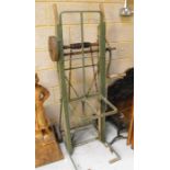 A large pair of antique sack trucks with racheted lift system