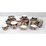 A quantity of 19th Century Royal Crown Derby Imari pattern cups and saucers (all A/F)