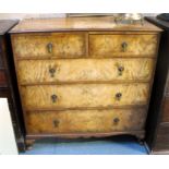 A figured walnut chest of two short & three long graduated drawers, on short cabriole legs, 106cm