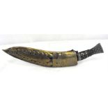 A Khukri with decorated hardwood handle, in a brass decorated sheath, 41cm long.