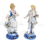 A pair of 19thC porcelain figures of a young man and girl marked D&T for Demartial & Tallandier of