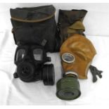 A British Army S6NBC Respirator in its case with Decontamination kit and a Russian Army Respirator