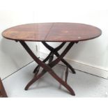 A 19th century mahogany folding campaign table, 112cm by 73cm.