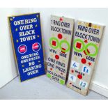 Three painted fairground signs