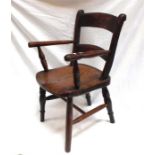 A child's elm elbow chair (repair to front leg and arm).