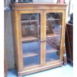 A Victorian walnut glazed bookcase with four adjustable shelves, 123cm wide. Condition Report ·