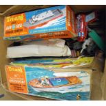 A Tri-ang 14 inch electric speed boat, boxed, a Tri-ang RAF air sea rescue tender, boxed. A