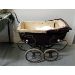 A Silver Cross dolls pram