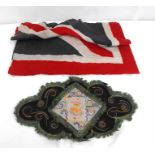 A WWI Somerset Regiment silk embroided panel, and a Union Jack flag (2).