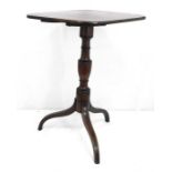 A 19th century figured mahogany tilt top table, with turned column on tripod base - 48cm wide