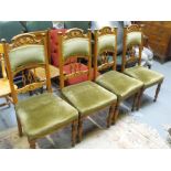 A set of four Art Nouveau oak dining chairs, and a single cane seated occasional chair (5)