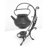 A Benham and Froud Arts & Crafts copper kettle on iron burner stand, in the manor of Dr