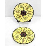 A pair of Henriot quimper oyster plates decorated flowers on a pale yellow ground 22cm diameter