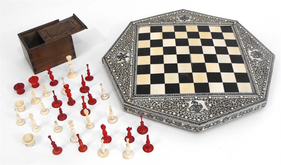 A late 19th century Anglo-Indian ivory games board and chess set. Condition Report There are four