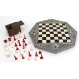 A late 19th century Anglo-Indian ivory games board and chess set. Condition Report There are four