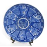 A Chinese blue and white charger, decorated birds and flowers 31cm diameter