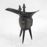 A Chinese bronze jue 18cm high