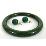 A pair of jade earing, and a jade bangle,