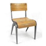 A retro metal and wood child's chair