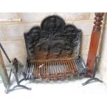 A cast iron fire basket, with cast fire back decorated in relief with a lion - 113 cm wide and hood.