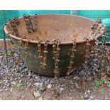 A large metal planter (possibly a dough bin) 116cm diameter